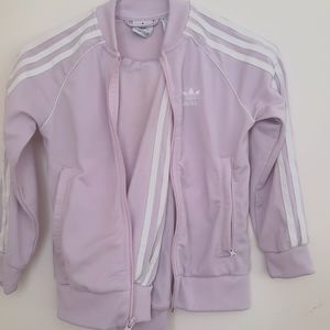 Adidas  tracksuit for kids.Colour pink. Size US 6-7 years.